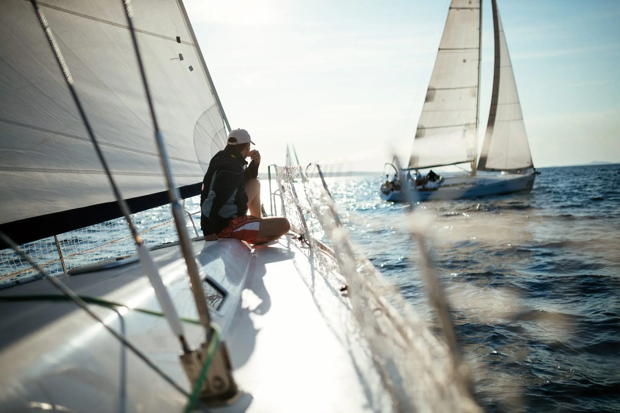 young-handsome-man-relaxing-on-his-sailboat